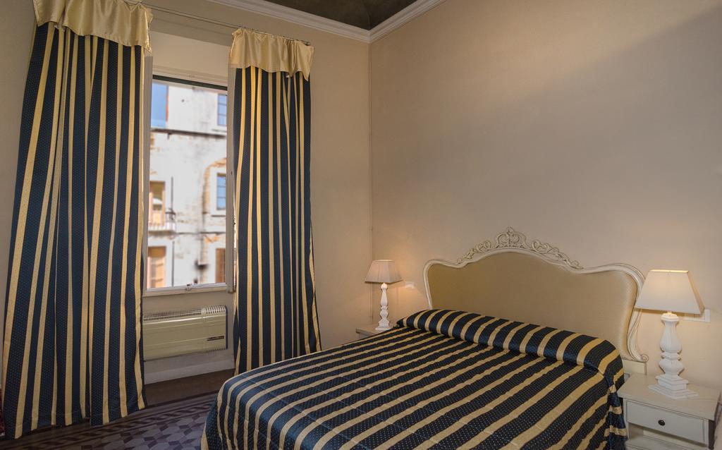 Hotel Galileo Pisa Pokoj fotografie